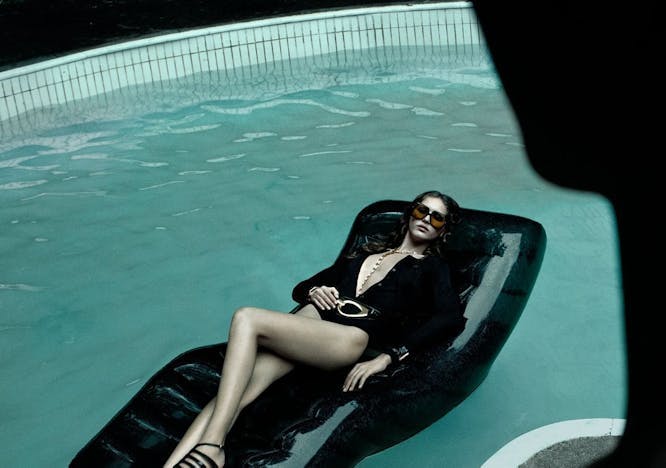 adult female person woman pool water swimming pool furniture glasses high heel